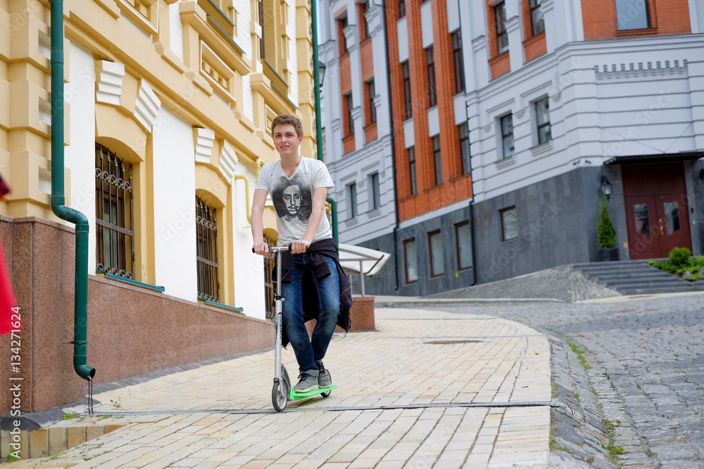 happy boy travel on kick scooter happy boy travel on kick scooter