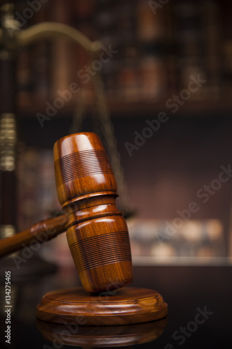 Law books, mallet of the judge, Courtroom background