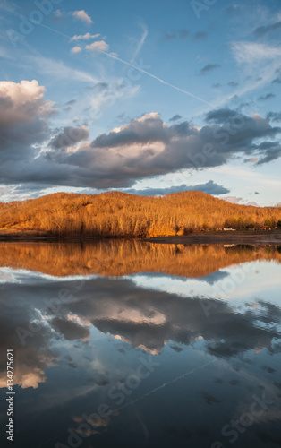 Mountain Water Reflection on Lake During Sunset © justinfegan
