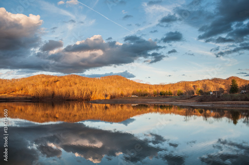 Mountain Water Reflection on Lake During Sunset