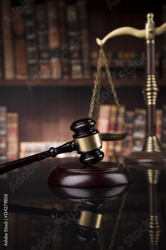 Принти на полотні Law and justice concept, Brown wooden background, beautiful refl