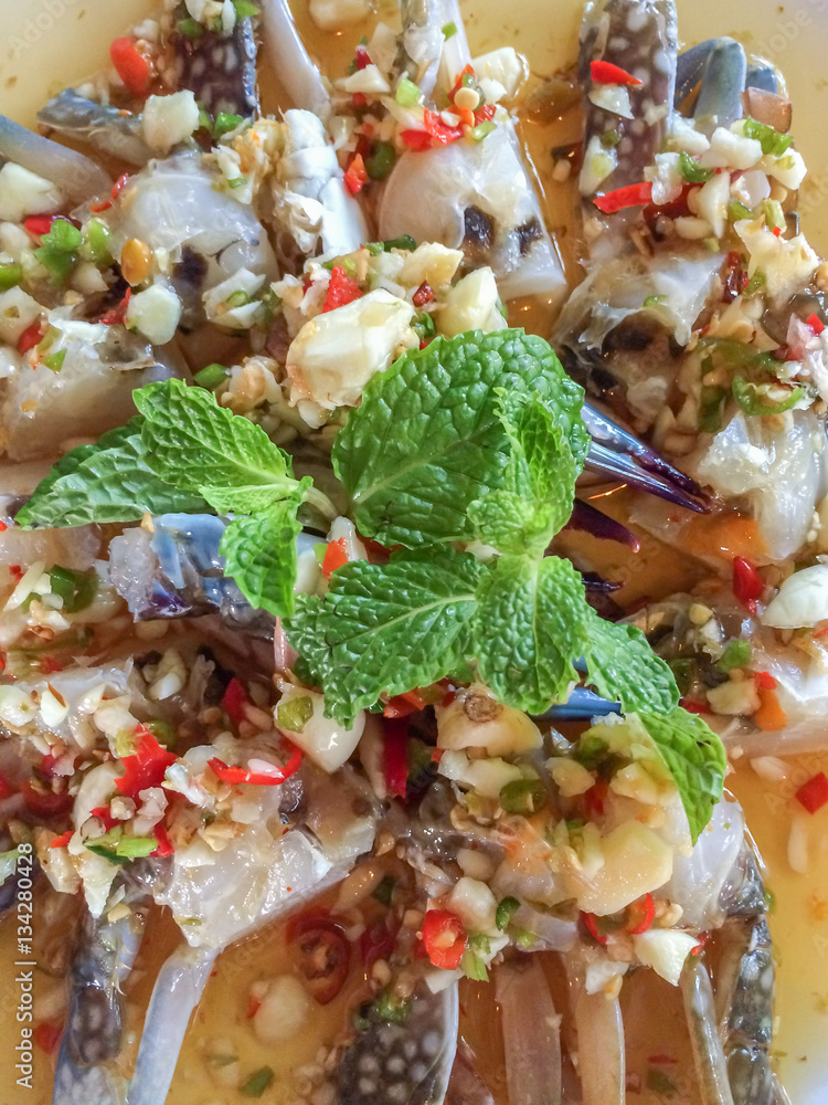 Thai food - Thai spicy blue crab spicy salad with garlic and chili, raw food