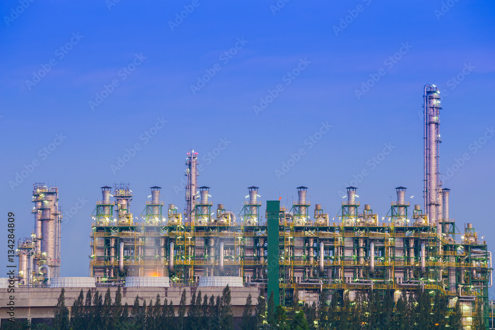 Fototapeta premium Oil refinery industrial plant with sky
