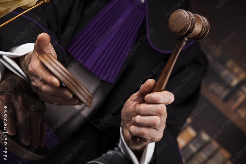 Justice and law concept. Male judge in a courtroom Justice and law concept. Male judge in a courtroom