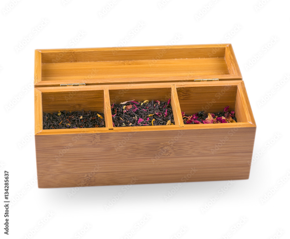 assortment of dry tea in wooden box, isolated on white assortment of dry tea in wooden box, isolated on white