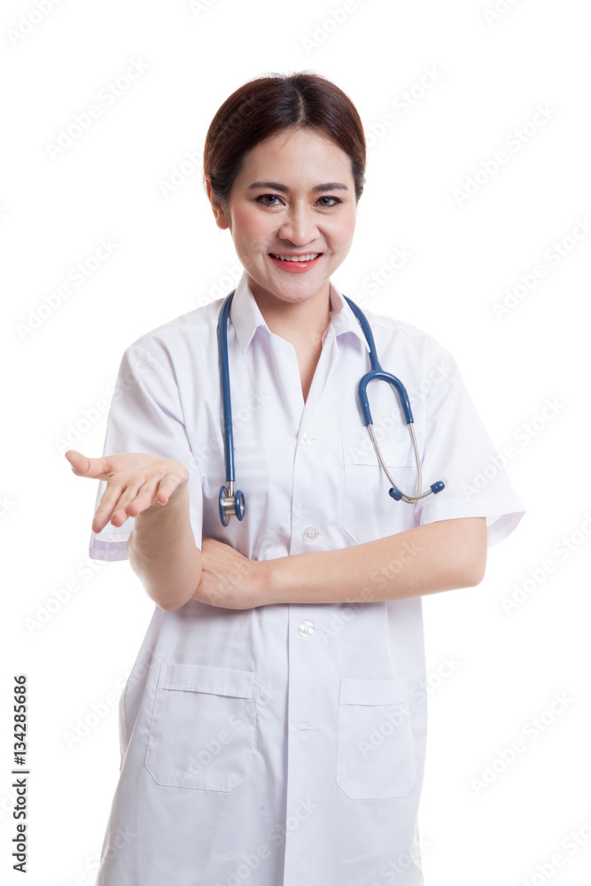 Asian young female doctor smile show her hand. Asian young female doctor smile show her hand.