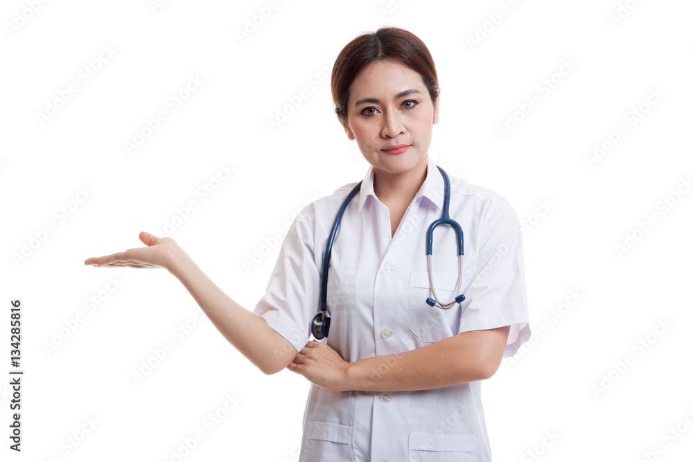 Asian young female doctor show something on her hand. Asian young female doctor show something on her hand.