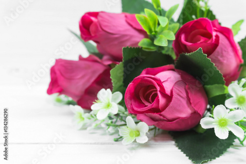 Roses on wooden board  Valentines Day background  wedding day.