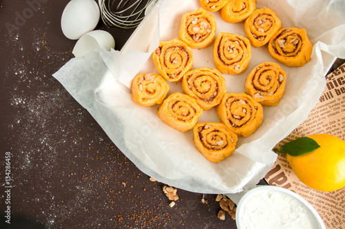 Pumpkin turmeric cinnamon swirl buns dough in baking form 
