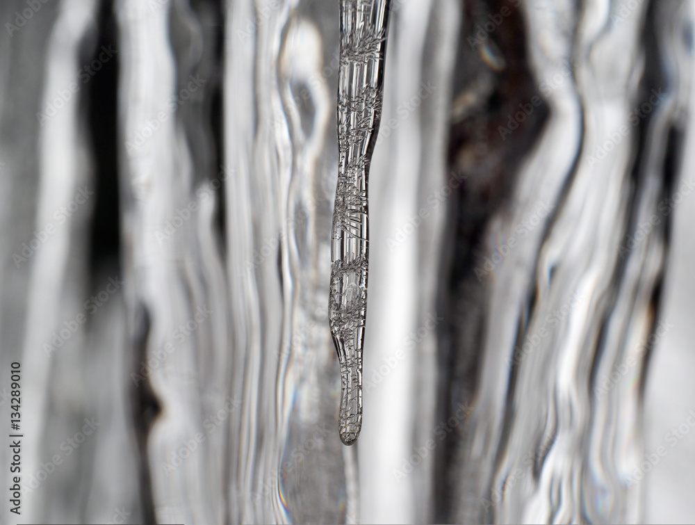 Beautiful icicle with ice patterns on the inside Beautiful icicle with ice patterns on the inside