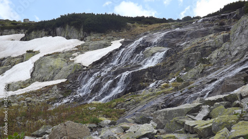 Defrosted snow which flows