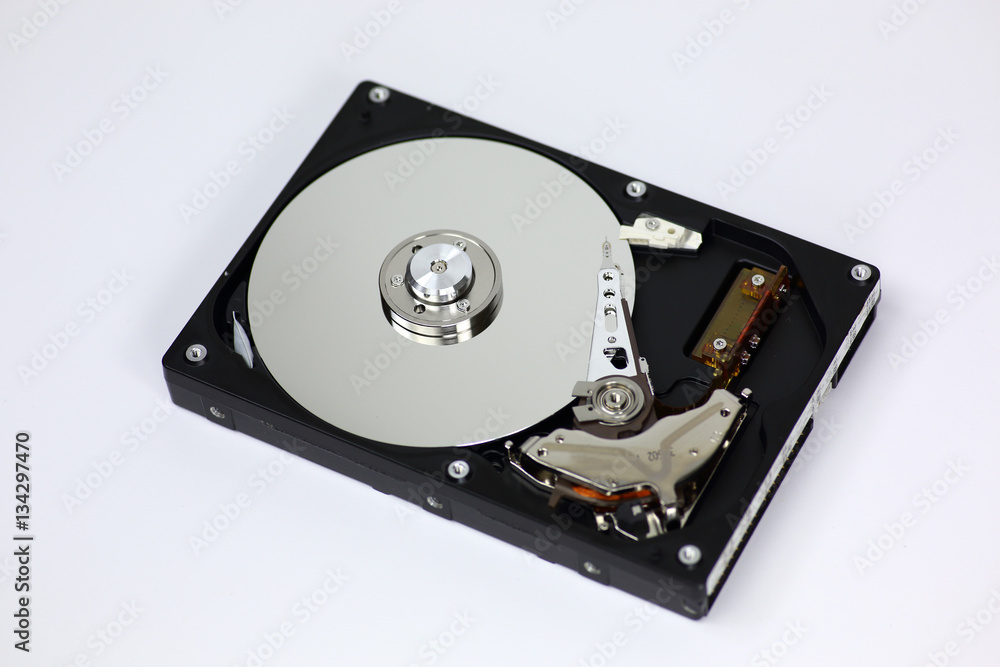 Harddisk drive (HDD) with top cover open isolated on white background Harddisk drive (HDD) with top cover open isolated on white background