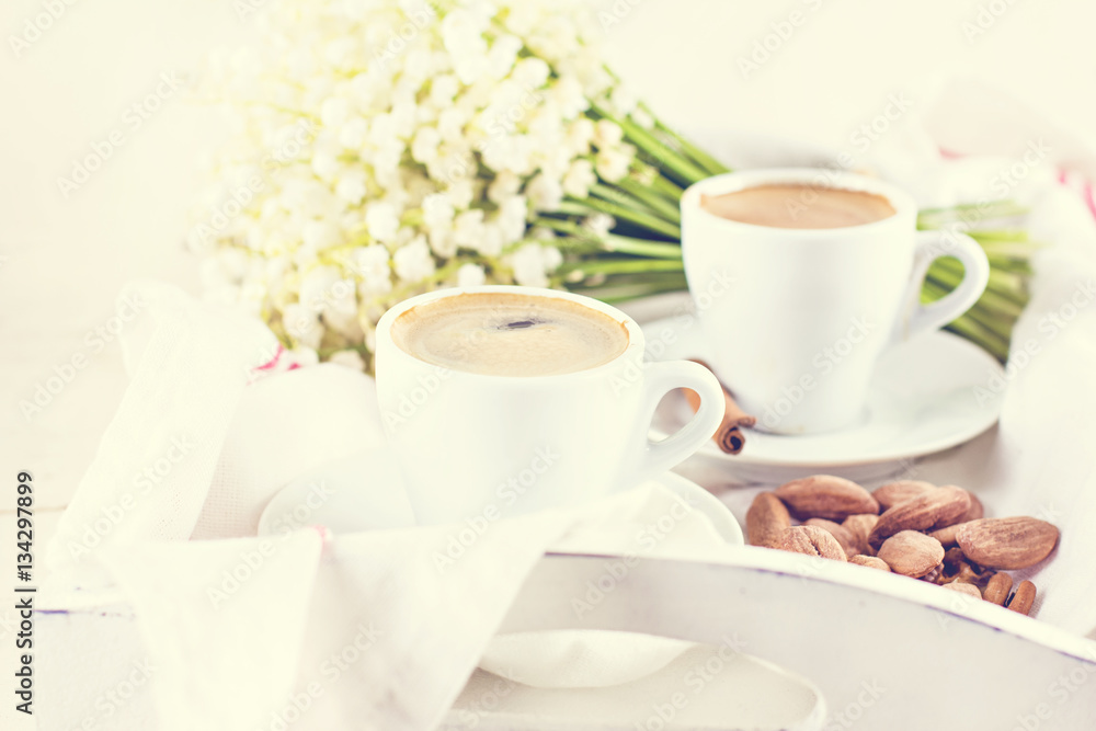 espresso, nuts and bouquet of flowers espresso, nuts and bouquet of flowers
