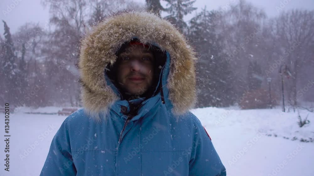 Portrait of a man during a snowfall Portrait of a man during a snowfall