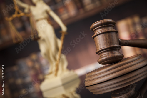 Law and justice concept, Brown wooden background, beautiful refl