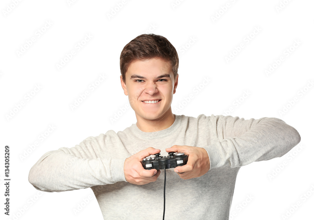 Teenager playing videogame on white background Teenager playing videogame on white background
