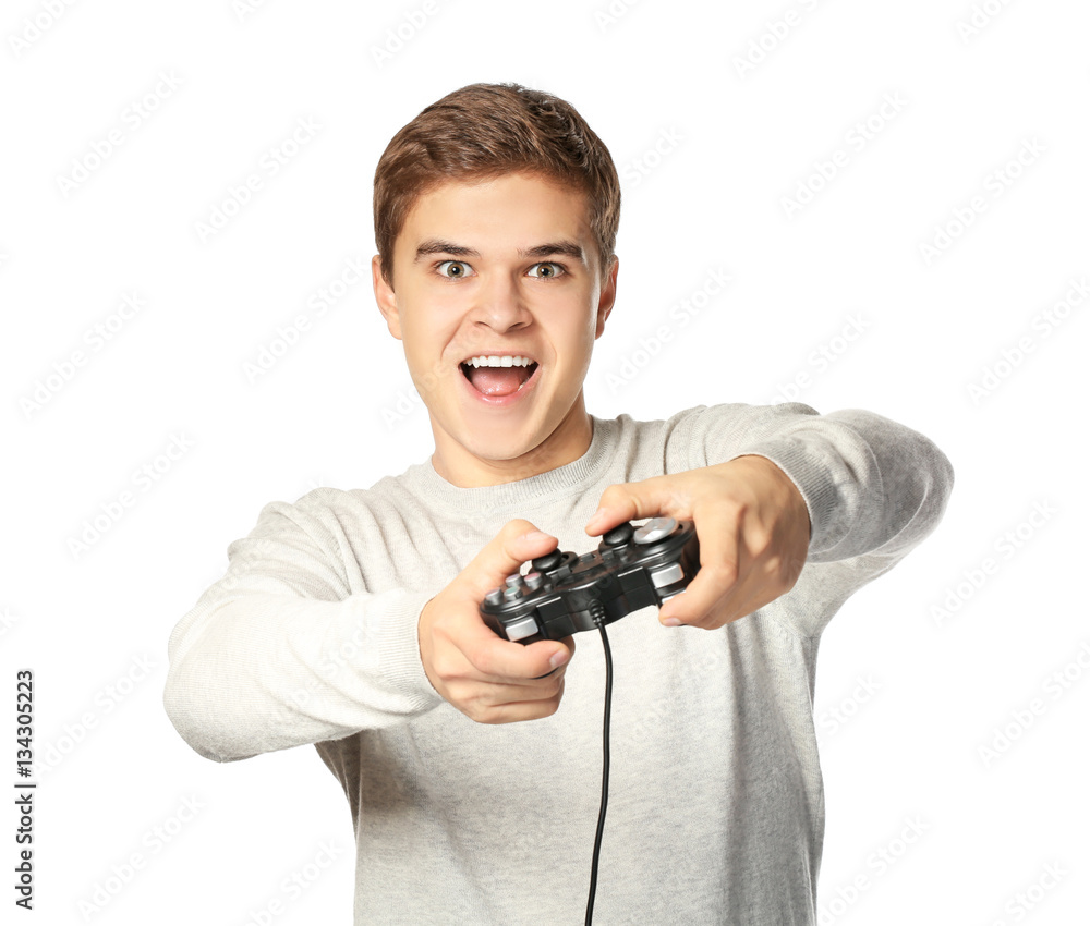 Teenager playing videogame on white background Teenager playing videogame on white background