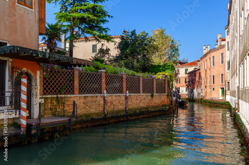 Small canal and colorful houses in Venice. © Rostislav Glinsky