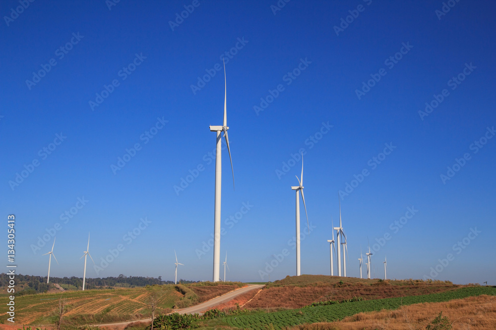 white wind turbine at the park white wind turbine at the park