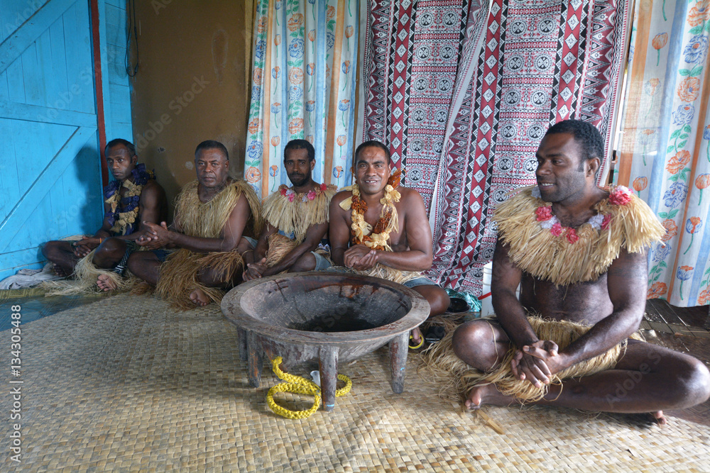 Indigenous Fijians men participate in traditional Kava Ceremony - obrazy, fototapety, plakaty 