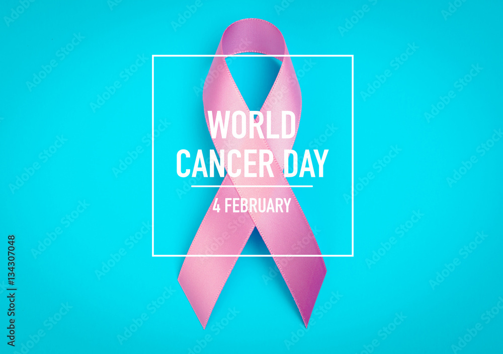 Obraz premium World cancer day : Breast Cancer Awareness Ribbon on blue Backgr