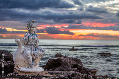 Hindu deity at sunset
