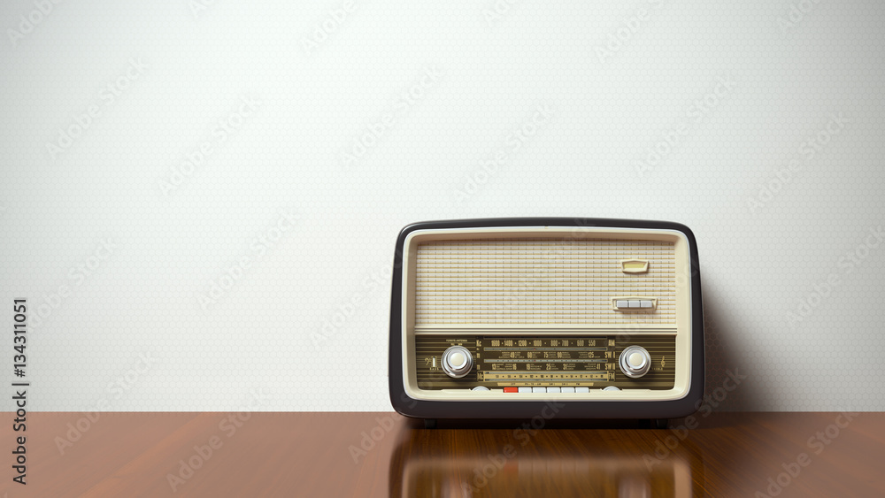 Obraz premium Rocznika antykwarski retro stary radio na tle