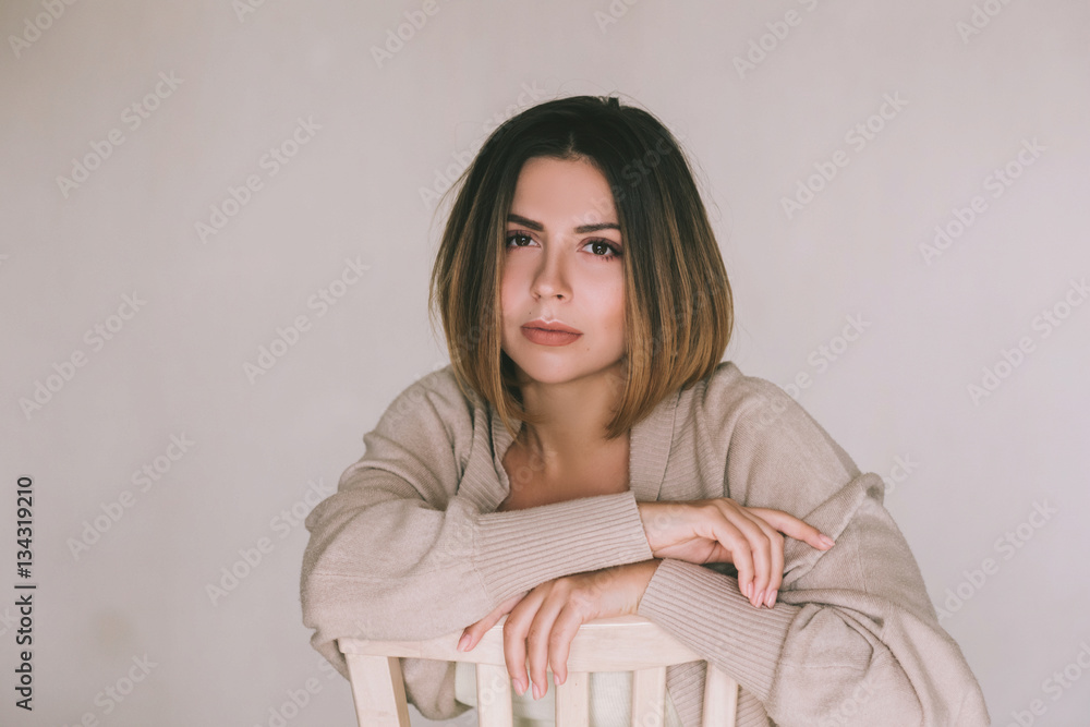 Portrait of beautiful and sexy young woman.Portrait of a normal girl looking camera. Beautiful woman portrait over brown background. Portrait of beautiful and sexy young woman.Portrait of a normal girl looking camera. Beautiful woman portrait over brown background.