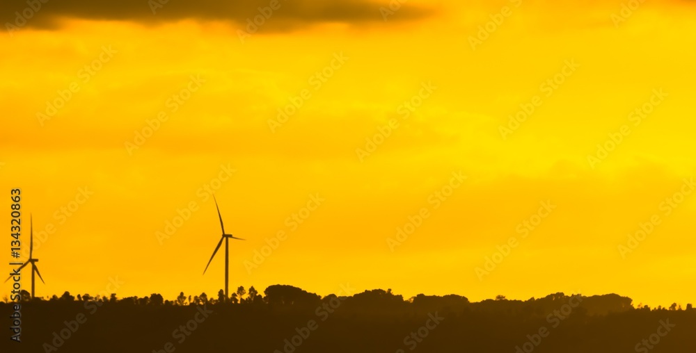 Obraz premium electric turbine with evening sky