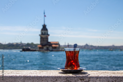 Photography Turkish tea on the background of the Maiden Tower