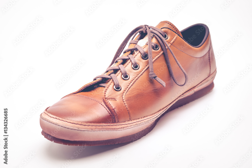 man leather brown shoes on white background. man leather brown shoes on white background.