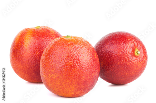 Three bloody red oranges