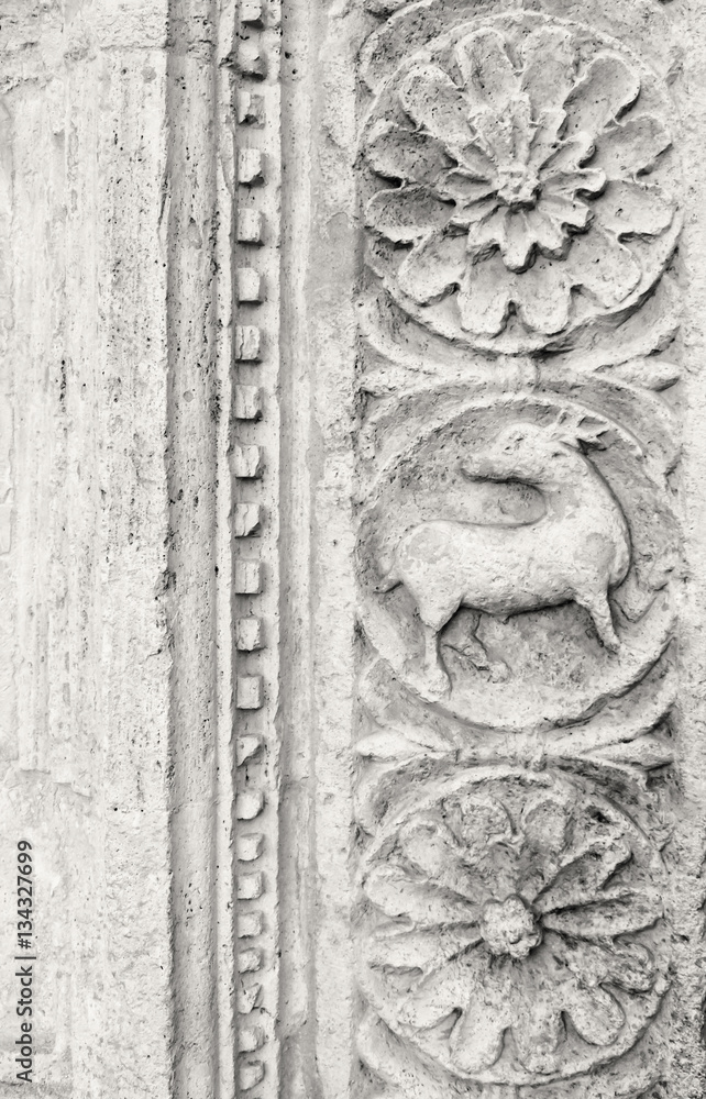 (Umbria, Italy)- Stone carved decorations in Saint Francis of Assisi basilica, neo-gothic style. (antique effect, sepia).
