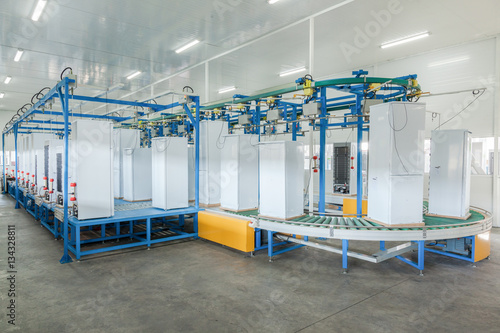 at the factory final inspection  of refrigerators on the conveyor belt