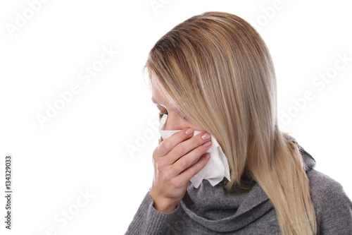 Woman caught cold , flu, running nose. Healthcare and medical concept isolated on white