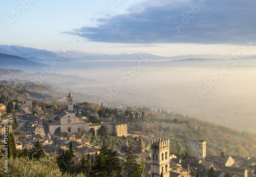  Assisi (Umbria), UNESCO world heritage site scenic panorama at sunset, golden hour.