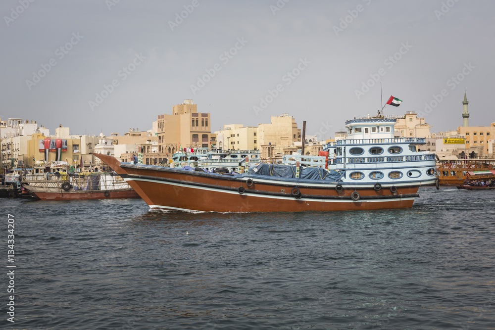 Piers of traditional water taxi boats in Dubai, UAE.