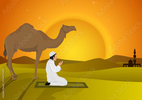 man praying and camel with sunset background