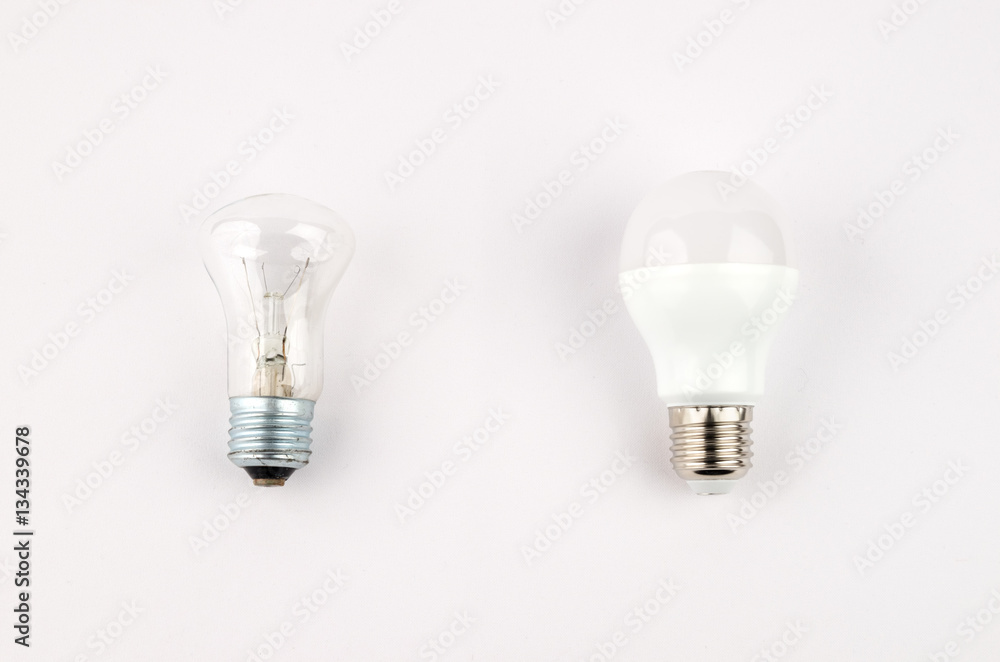 several LED energy saving light bulbs over the old incandescent, use of economical and environmentally friendly light bulb concept several LED energy saving light bulbs over the old incandescent, use of economical and environmentally friendly light bulb concept