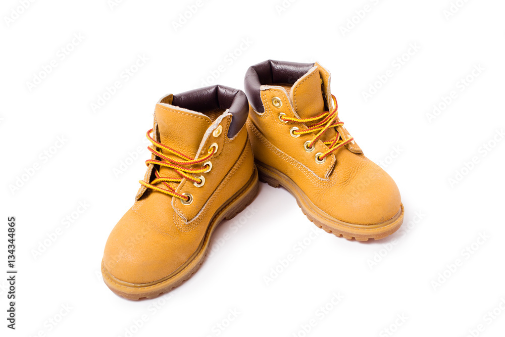 Yellow boots isolated on white background