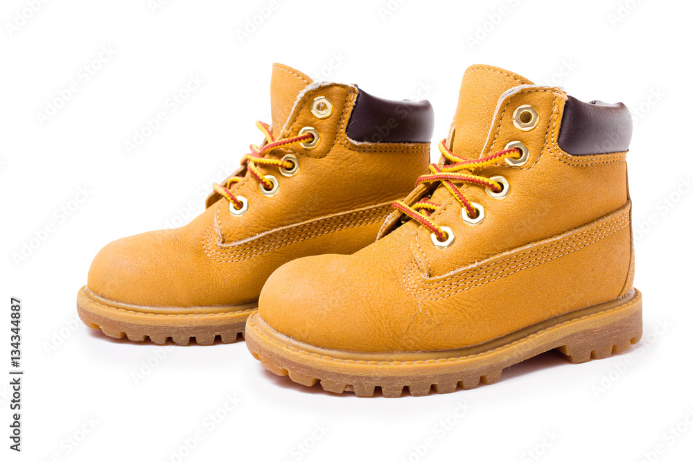 Yellow boots isolated on white background