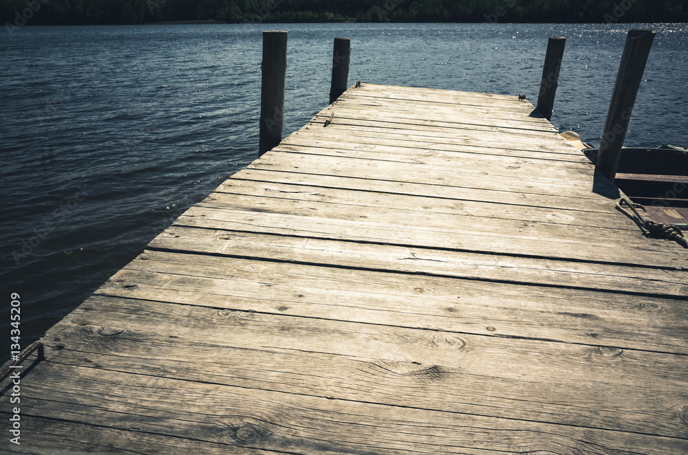 Obraz premium Empty wooden pier, vintage toned