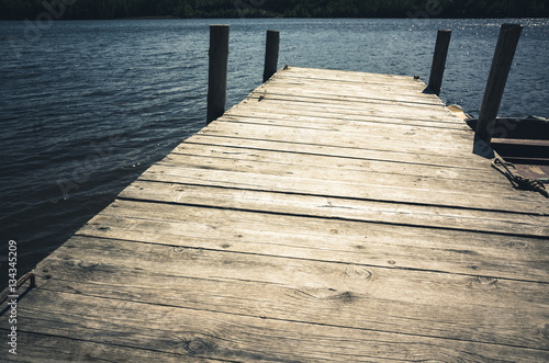 Empty wooden pier  vintage toned