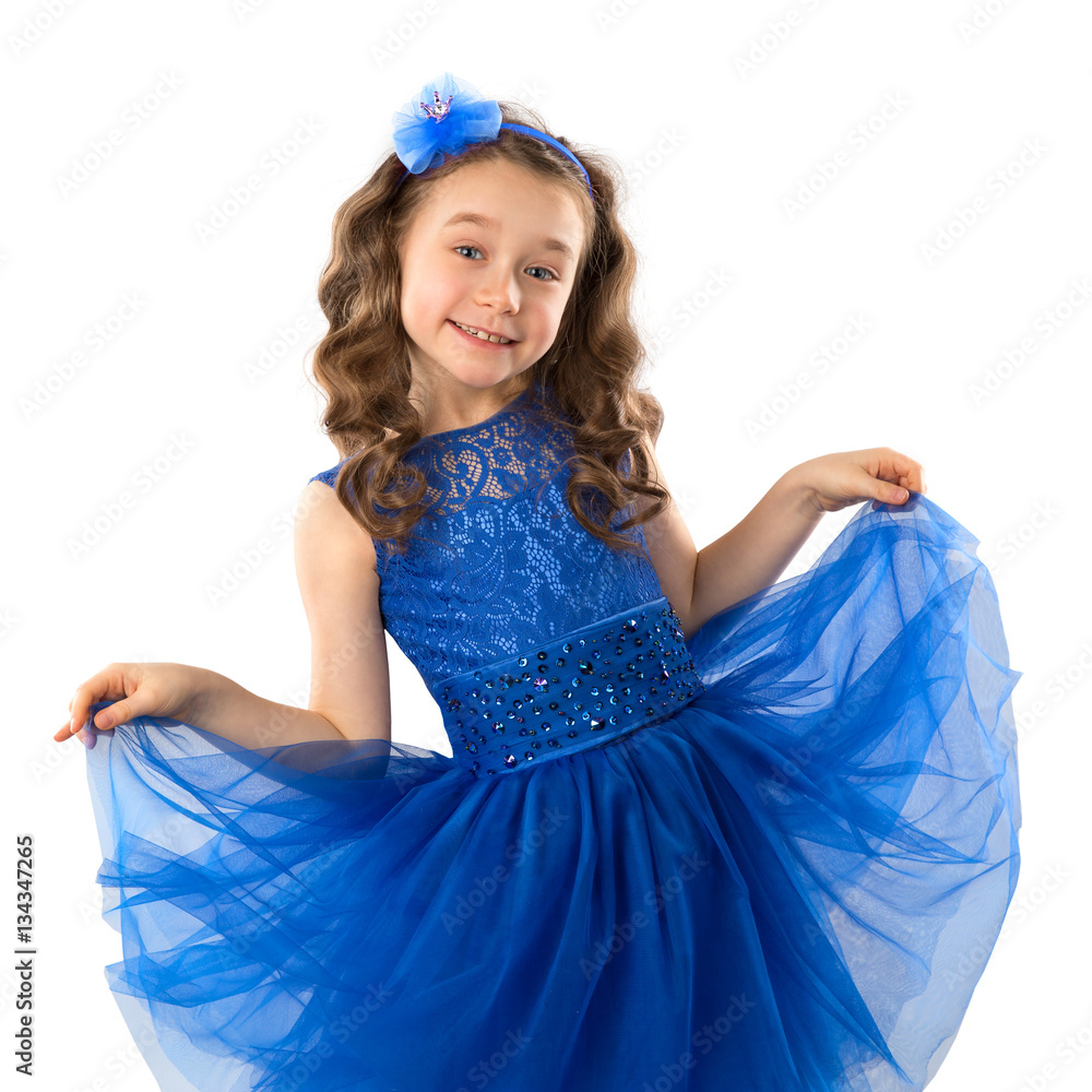 Portrait of a cute little girl in blue princess dress, isolated on ...