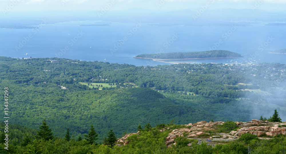 Acadia National Park near town of Bar Harbor, viewed from Cadillac Mountain. State of Maine, USA. Fog and clouds