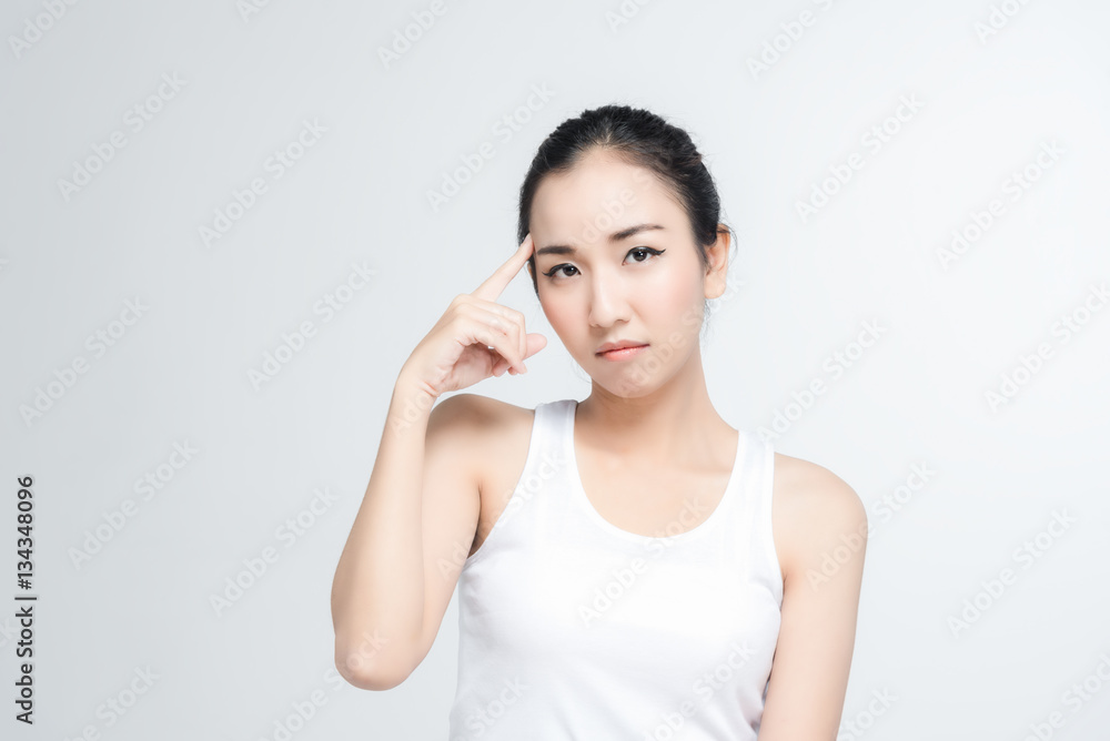 Happy asian young woman beautiful smile with think gesture posture isolated on white background Happy asian young woman beautiful smile with think gesture posture isolated on white background
