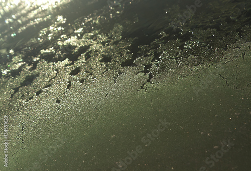 Frost on car glass surface.