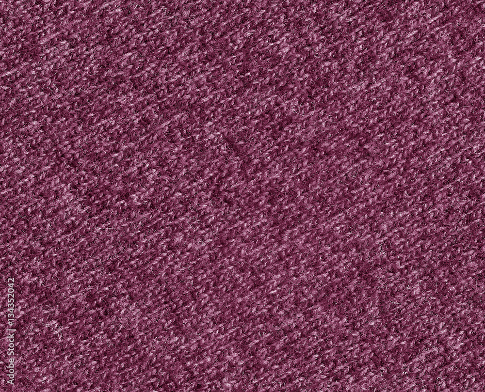 Fototapeta premium Pink color knitting cloth texture.