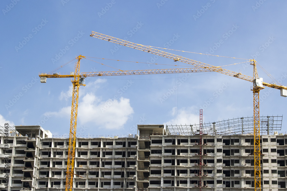 Inside place for many tall buildings under construction and cran Inside place for many tall buildings under construction and cran