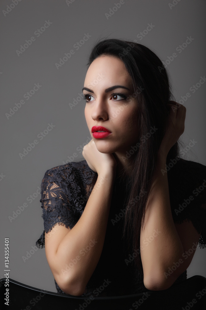 Fototapeta premium Fashion portrait of beautiful young woman